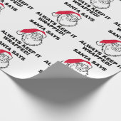 De kerstman zegt dat je hem in de verpakking moet  cadeaupapier (Hoek)