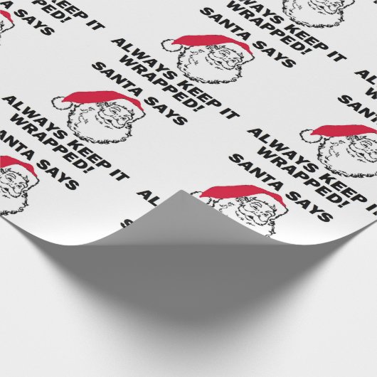 De kerstman zegt dat je hem in de verpakking moet  cadeaupapier (Hoek)