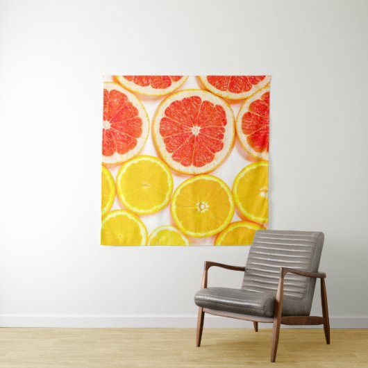 De kleurencitrusplakken van de gradiënt op witte a wandkleed (In Situ (horizontaal))