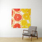 De kleurencitrusplakken van de gradiënt op witte a wandkleed (In situ)