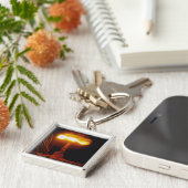 De Knothole van de Bevordering van de verrichting, Sleutelhanger (Zijkant)