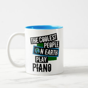 De koelste mensen op aarde spelen piano tweekleurige koffiemok