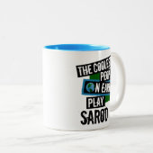 De koelste mensen op aarde spelen sarod tweekleurige koffiemok (Voorkant rechts)