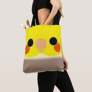 De kop van een kaneel bonte mannelijke cockatiel tote bag