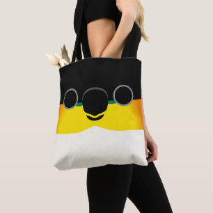 De kop van een zwartkopcaique tote bag