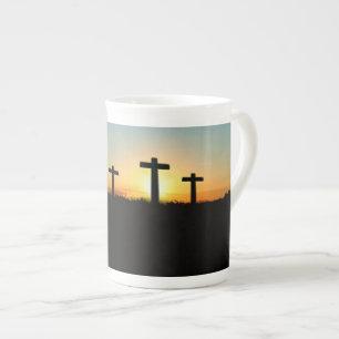 De kruisingen van de kroonkalk bij zonsondergang porselein kop