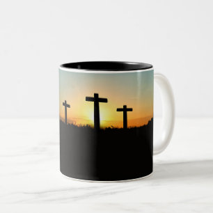 De kruisingen van de kroonkalk bij zonsondergang tweekleurige koffiemok