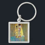 De Kus 2 van Gustav Klimt Sleutelhanger<br><div class="desc">Dit schilderij met de titel The Kiss 2 is gemaakt door de beroemde kunstenaar Gustav Klimt. Over Gustav KlimtGustav Klimt ging het om een Oostenrijkse symbolist schilder en een van de meest prominente leden van de Wenen-afscheidingsbeweging. Hij werd in 1897 een van de oprichters en presidenten van de Wiener Sezession...</div>