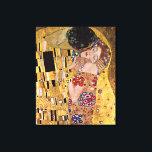 De Kus, Gustav Klimt Canvas Afdruk<br><div class="desc">Gustav Klimt De Kus (originele Der Kuss) is geschilderd door Gustav Klimt en is waarschijnlijk zijn bekendste werk. Hij begon er in 1907 aan te werken en het is het hoogtepunt van zijn zogenaamde 'Gouden Periode'. Het toont een paar, in verschillende tinten van goud en symbolen, het delen van een...</div>