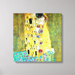 De kus van Gustav Klimt Canvas Afdruk<br><div class="desc">De Kiss van Gustav Klimt canvasprint.The Kiss (Lovers) werd geschilderd door de Oostenrijkse symbolistische schilder Gustav Klimt tussen 1908 en 1909, het hoogtepunt van zijn "Gouden Periode", toen hij een aantal werken in een soortgelijke vergulde stijl schilderde. Een perfect vierkant, het doek toont een paar omhelzende, hun lichamen verstrengeld in...</div>