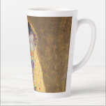 De kus van Gustav Klimt Latte Mok<br><div class="desc">De Kus van Gustav Klimt The Kiss is een oliescanvas met goudblad, zilver en platina. van de Oostenrijkse symbolistische schilder Gustav Klimt. Het werd ooit geschilderd in 1907 en 1908, op het hoogtepunt van wat wetenschappers zijn "Gouden Periode" noemen. De Kus heeft sinds zijn voltooiing in 1908 het publiek enthousiast...</div>