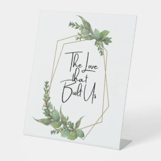 De liefde die ons heeft opgebouwd reclamebord met voetstuk