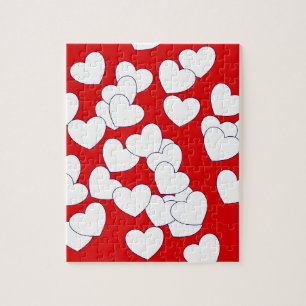 De "liefde"-puzzel, rood en wit hart legpuzzel