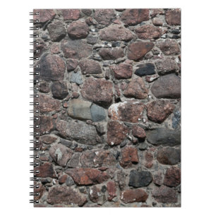 De middeleeuwse textuur van de steenmuur ondergron notitieboek