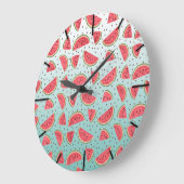 De mooie watermeloen snijdt en zadenpatroon grote klok (Hoek)