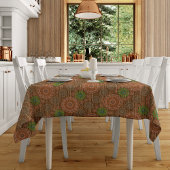 De Oranje bloemige regenachtige snijvezels zijn ge Tafelkleed