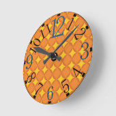 De oranje jaren 70 stijl cirkel ronde klok (Hoek)
