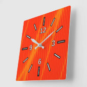 De oranje Laserstraal kijkt Lijnen op een Rode Vierkante Klok (Hoek)