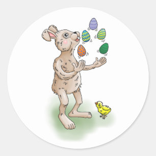 De paashaas jongleert met de paaseieren ronde sticker