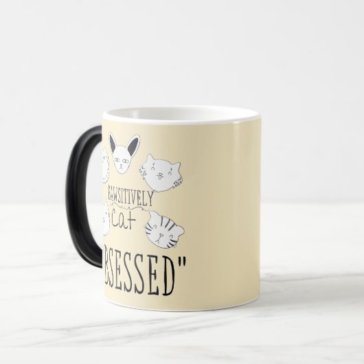 De "passief geobsedeerde kat" magische mok (Voorkant links)