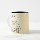 De "passief geobsedeerde kat" tweekleurige koffiemok (Voorkant links)