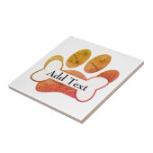 De peul van de peul drukt en slaat met de tekst va tegeltje (Zijkant)