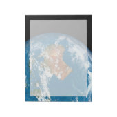 De planeet Aarde toont wolken boven Australië. Notitieblok (Linkerzijde)