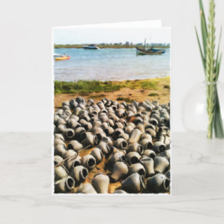 De potten van de krab bij de lege kaart van Luzia