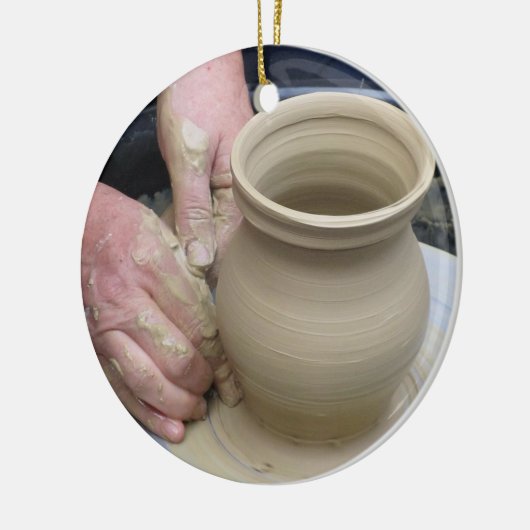 De pottenbakker en de klei keramisch ornament (Links)