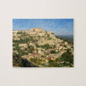 De provinciale bergstad schijnt in het ochtendlich legpuzzel (Horizontaal)