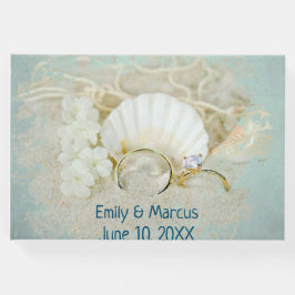 De Rings van het huwelijk en Seashell in Zand Gastenboek