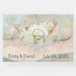 De Rings van het huwelijk in Seashell en Zand Gastenboek