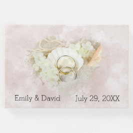 De Rings van het huwelijk in Seashell en Zand Gastenboek