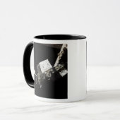 De robotarm van het systeem met afstandsbediening mok (Voorkant links)