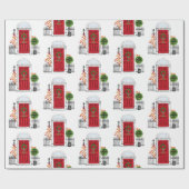 De rode kerstdeur voor feestdagen is verpakt papie cadeaupapier (Vlak)