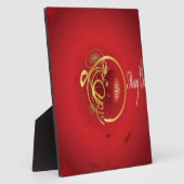 De rode kersttaartjes hebben een verlichte fijne d fotoplaat (Zijkant)