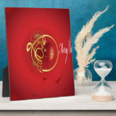 De rode kersttaartjes hebben een verlichte fijne d fotoplaat (Zijkant)