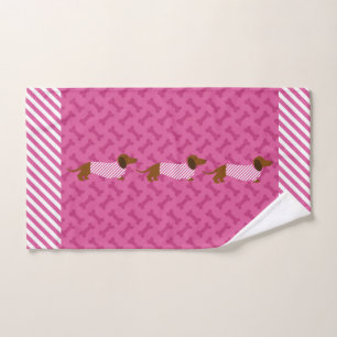 De roze en Witte Handdoek van de Hand van de