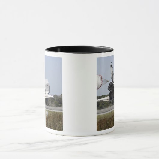 De ruimtependelAtlantis ontruimt zijn belemmerings Mok (Midden)