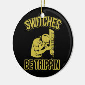 De Schakelaars van de elektricien zijn de Drijvend Keramisch Ornament (Links)