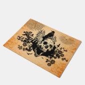 De schedel met vleugels en kraai met bloemen deurmat (Schuin)