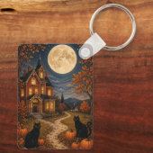 De Schildwachten van de Herfstmaan Sleutelhanger (Achterkant)