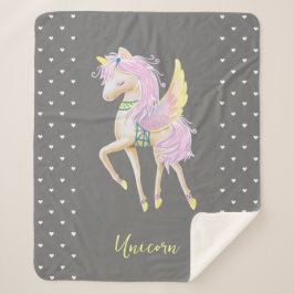 De Sherpa Blanket heeft een leuke eenhoorn. Deken