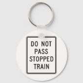 De Sleutelhanger van de overgeslagen trein niet ov (Achterkant)