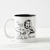 De socialisatie vergeten tweekleurige koffiemok (Links)