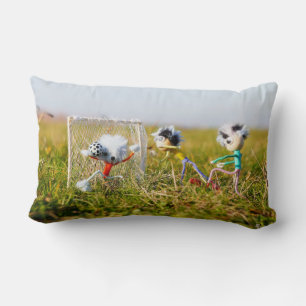 De speelse Fubby's die voetbal spelen.Kussens Kussen