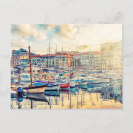 De stad Cannes in de avond Briefkaart