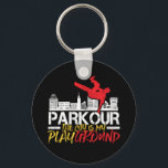 De stad is mijn speelplein en freerunning sleutelhanger<br><div class="desc">De stad is mijn speelplaats. Grappig en grappig design voor degenen die van parkour en freerunning houden. Koel  en noodlijdende designproducten voor buitenshuis. Ideaal voor mensen die van buitenactiviteiten en extreme sporten houden. Geweldig kerstcadeau en verjaardagscadeau voor vader,  broer,  zoon,  kleinzoon,  vriendje of vriend.</div>