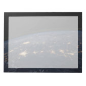 De stad ligt in het zuiden van de VS. Notitieblok (Voorkant)