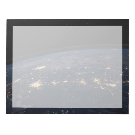 De stad ligt in het zuiden van de VS. Notitieblok (Voorkant)